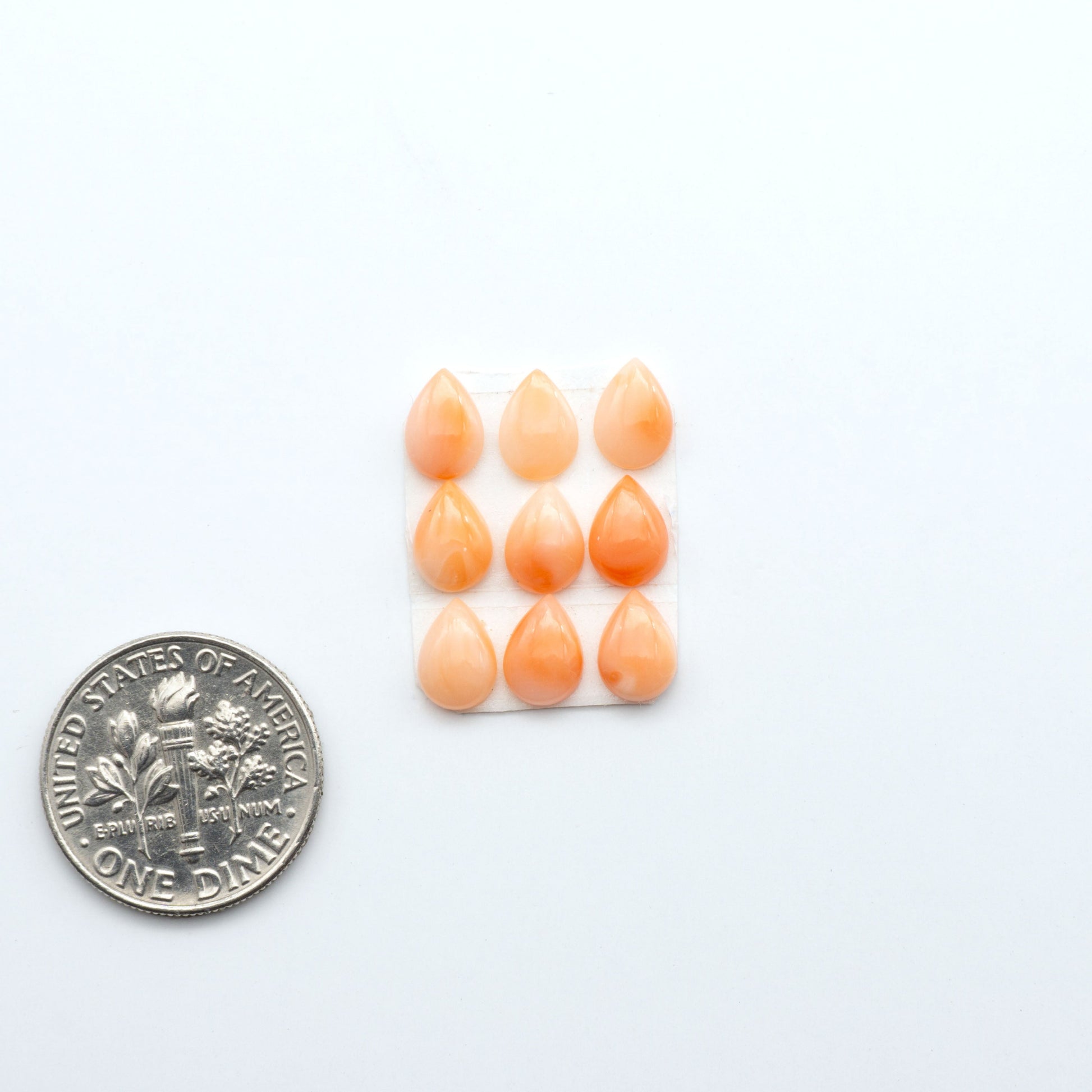 Discover natural pink Coral cabochons with soft salmon hues and smooth polish, ideal for creating timeless handcrafted rings, pendants, and custom designs.