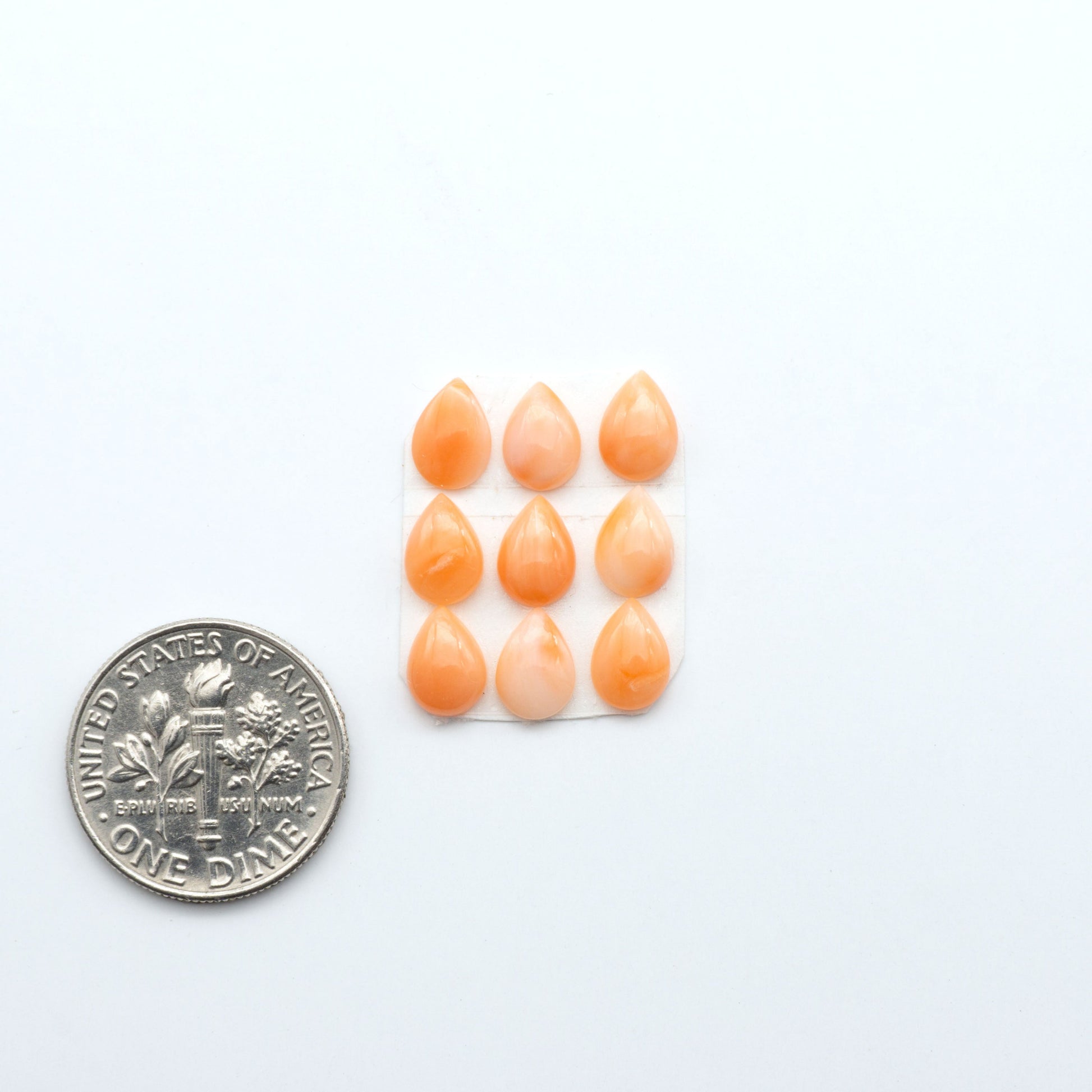 Discover natural pink Coral cabochons with soft salmon hues and smooth polish, ideal for creating timeless handcrafted rings, pendants, and custom designs.