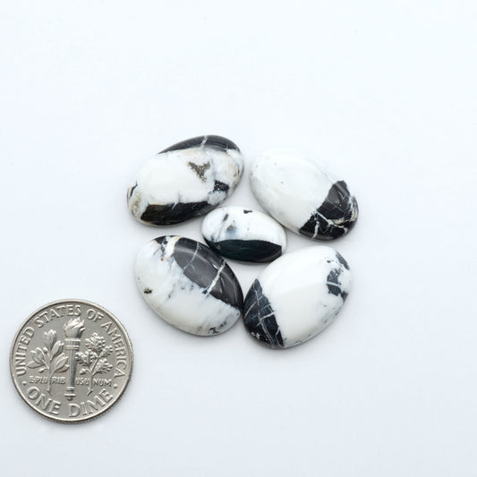 Natural White Buffalo Stone Cabochons are semi-precious gemstones cut into shapes ideal for jewelry-making, making them an excellent choice for artisans.