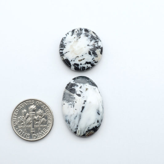 Natural White Buffalo Stone Cabochons are semi-precious gemstones cut into shapes ideal for jewelry-making, making them an excellent choice for artisans.
