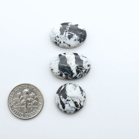 Natural White Buffalo Stone Cabochons are semi-precious gemstones cut into shapes ideal for jewelry-making, making them an excellent choice for artisans.