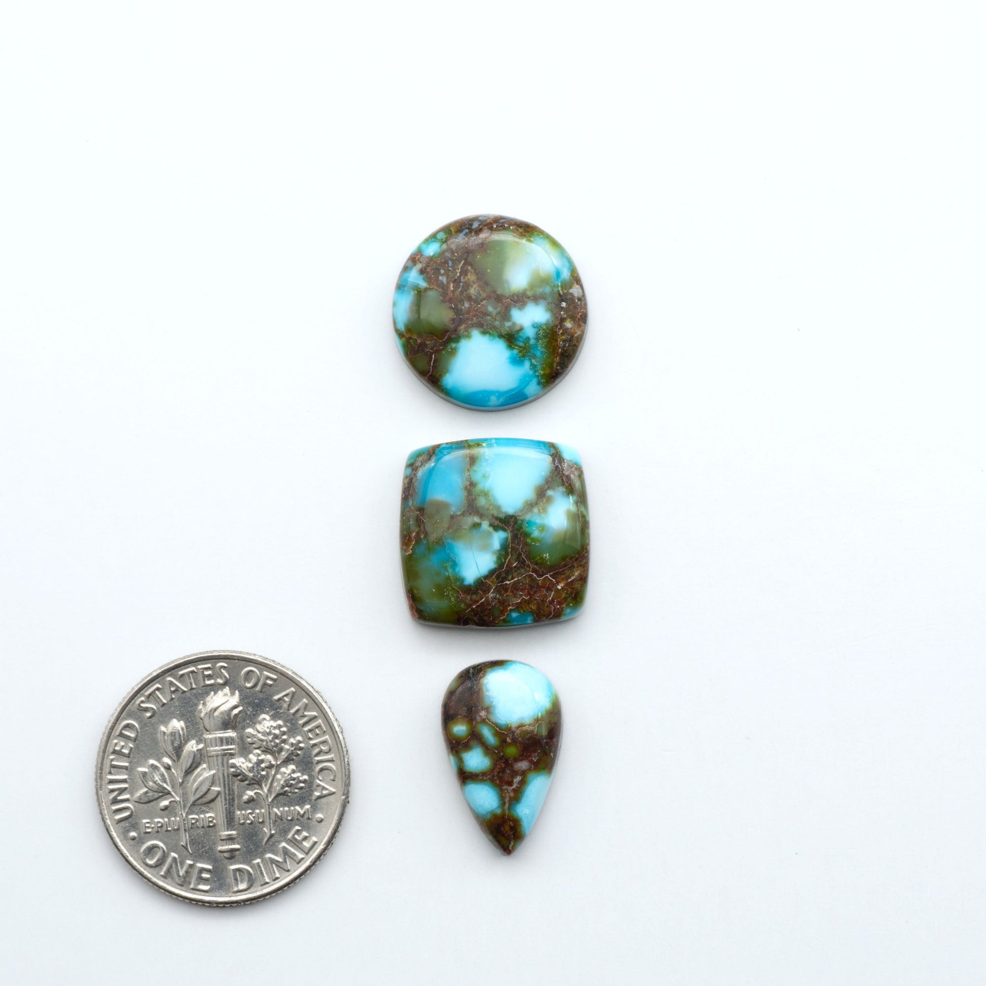 Kingman Turquoise Cabochons are a staple in the jewelry industry, known for their stunning blue-green color. Perfect for necklaces, earrings, and more!