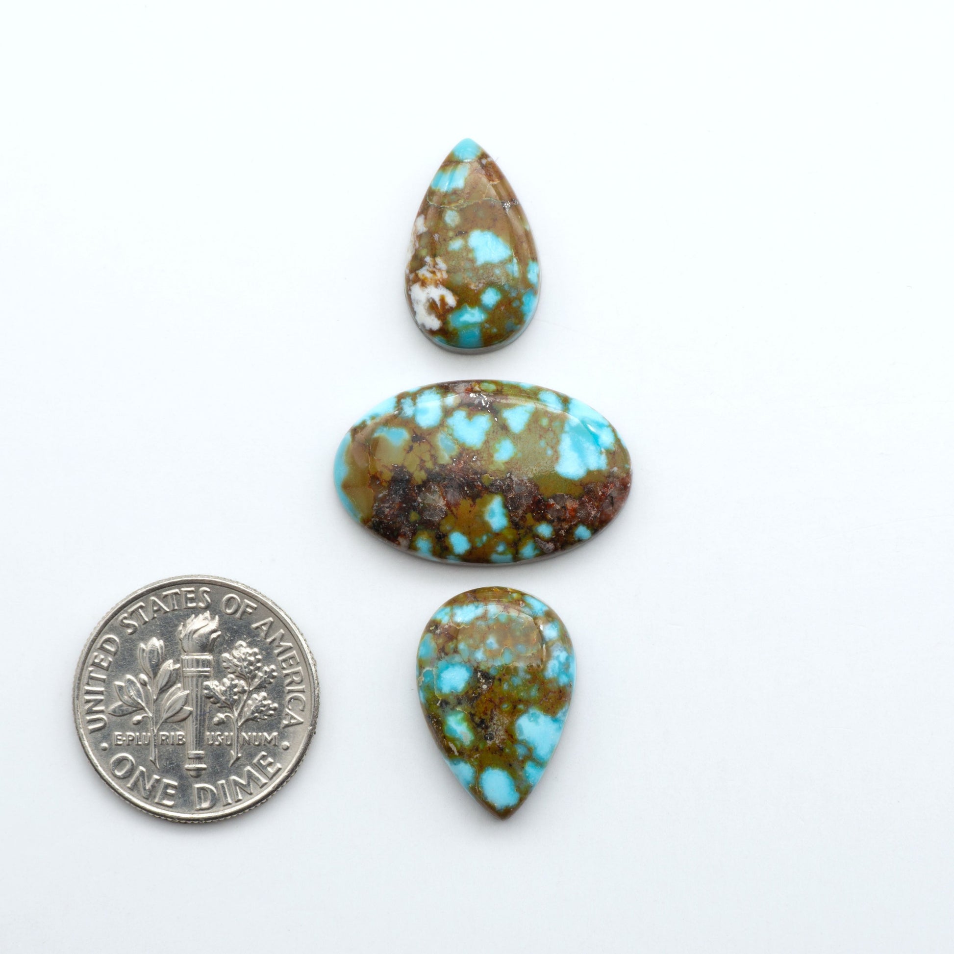 Kingman Turquoise Cabochons are a staple in the jewelry industry, known for their stunning blue-green color. Perfect for necklaces, earrings, and more!