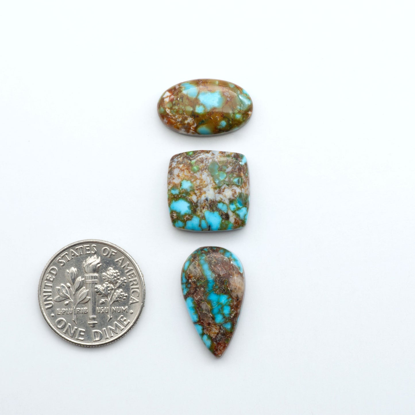 Kingman Turquoise Cabochons are a staple in the jewelry industry, known for their stunning blue-green color. Perfect for necklaces, earrings, and more!