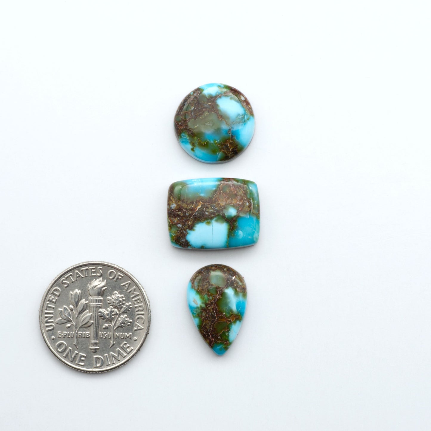 Kingman Turquoise Cabochons are a staple in the jewelry industry, known for their stunning blue-green color. Perfect for necklaces, earrings, and more!