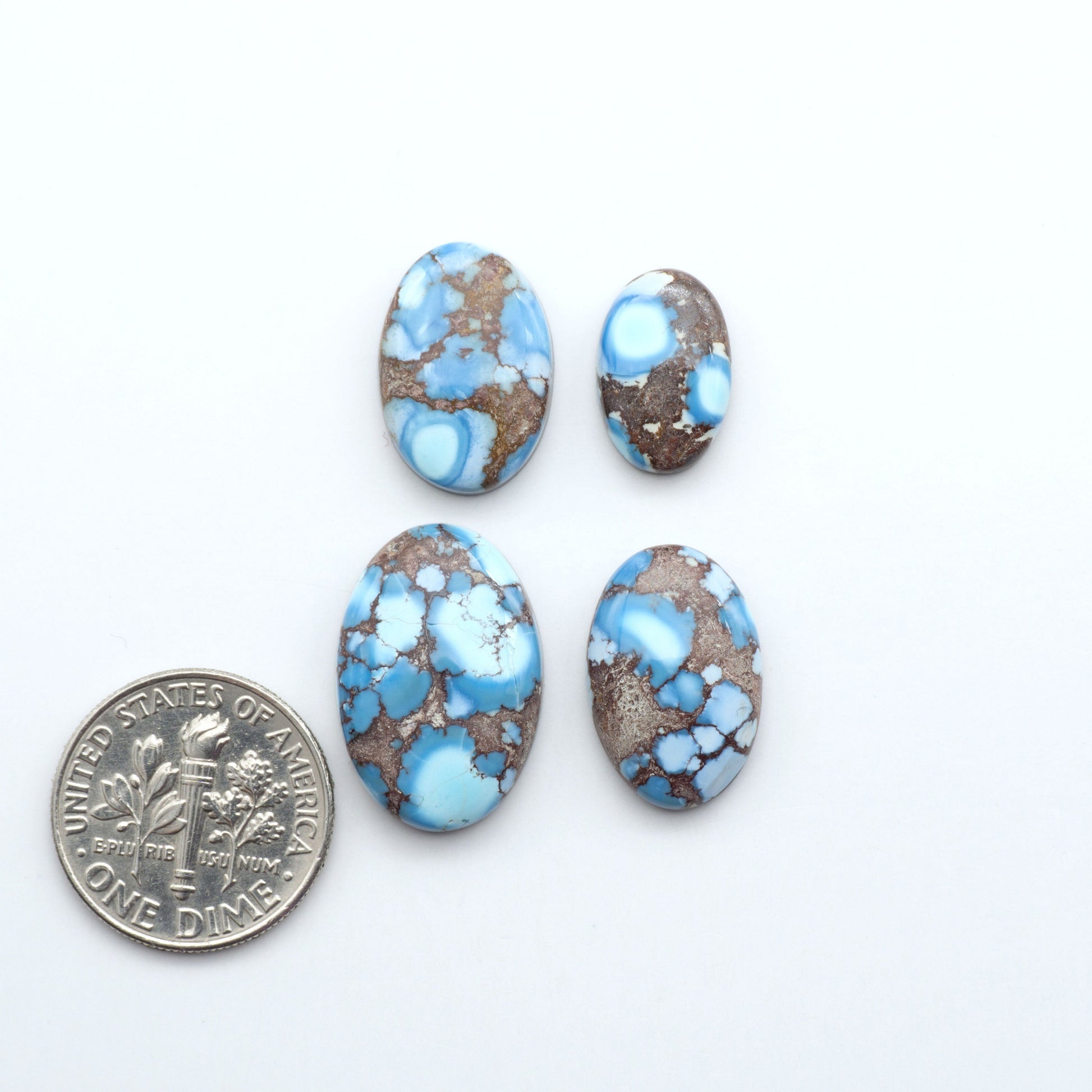 Discover the beauty of Natural Golden Hills Turquoise—prized for its icy blue tones, golden matrix, and exceptional quality. Ideal for artisan jewelry designs.

