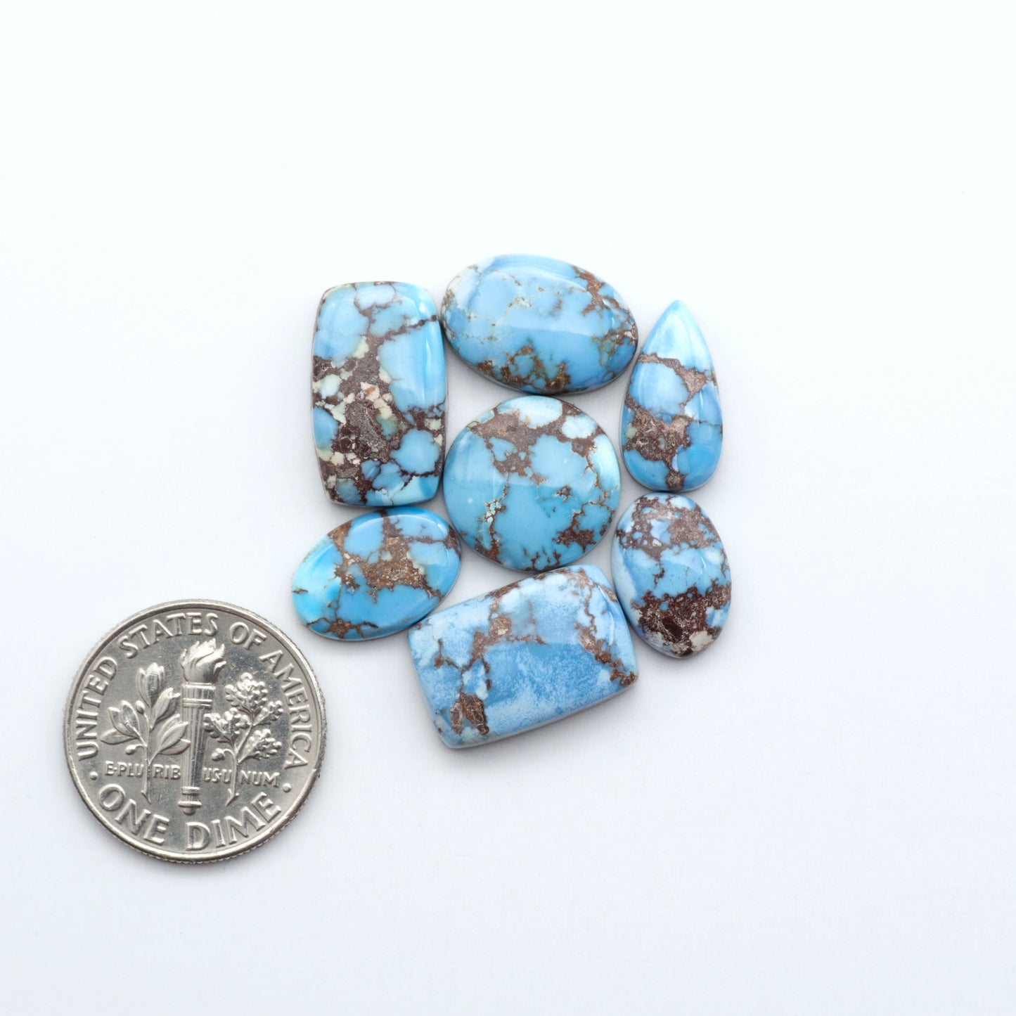 Discover the beauty of Natural Golden Hills Turquoise—prized for its icy blue tones, golden matrix, and exceptional quality. Ideal for artisan jewelry designs.

