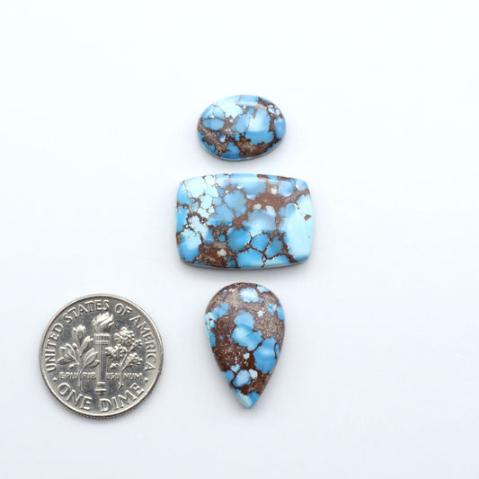 Discover the beauty of Natural Golden Hills Turquoise—prized for its icy blue tones, golden matrix, and exceptional quality. Ideal for artisan jewelry designs.

