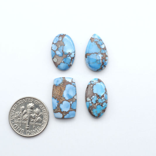 Discover the beauty of Natural Golden Hills Turquoise—prized for its icy blue tones, golden matrix, and exceptional quality. Ideal for artisan jewelry designs.

