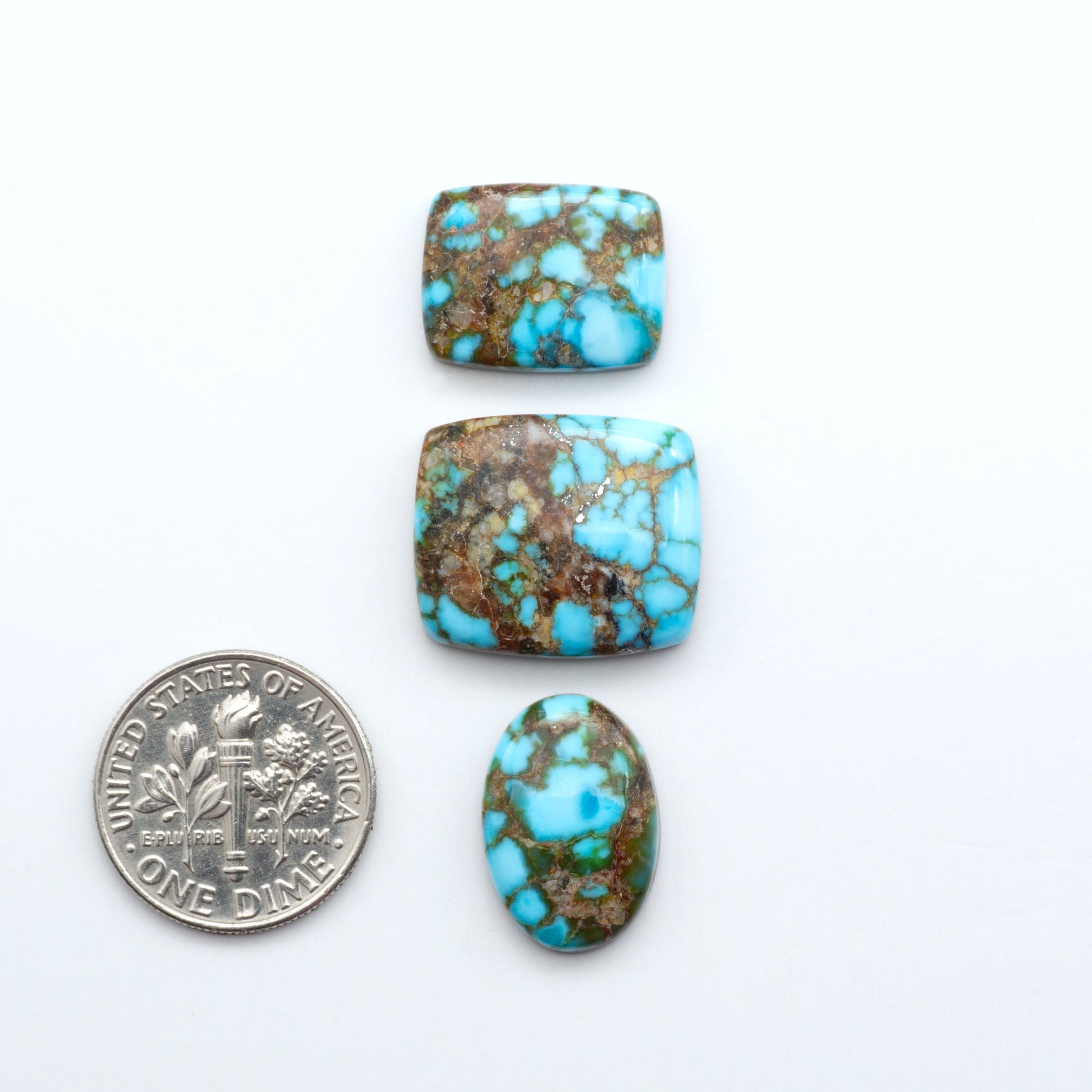 Kingman Turquoise Cabochons are a staple in the jewelry industry, known for their stunning blue-green color. Perfect for necklaces, earrings, and more!