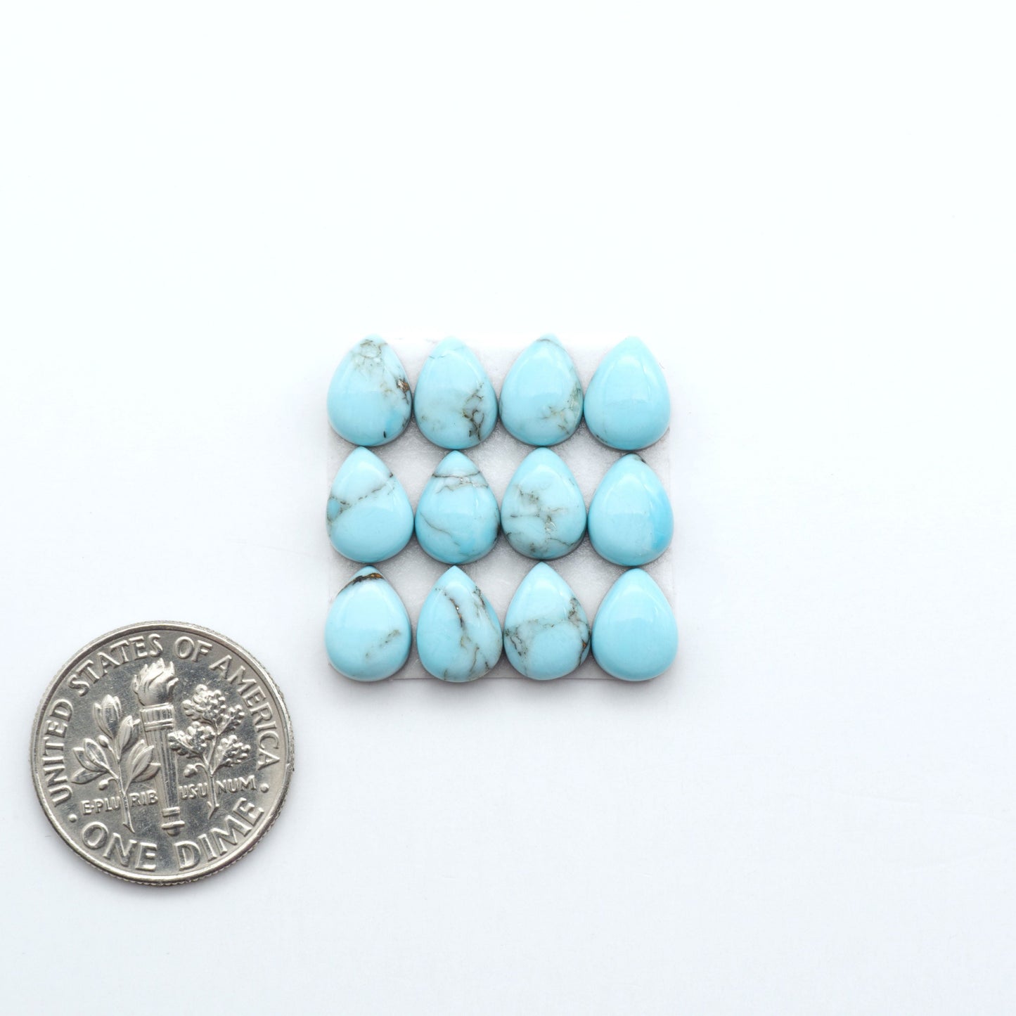Enhance your jewelry designs with Pressed Turquoise Nugget Cabochons. Crafted from composite materials they add a captivating touch to your creations.