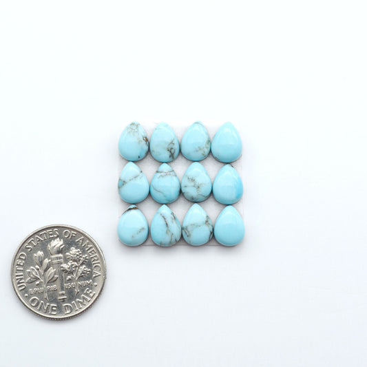 Enhance your jewelry designs with Pressed Turquoise Nugget Cabochons. Crafted from composite materials they add a captivating touch to your creations.