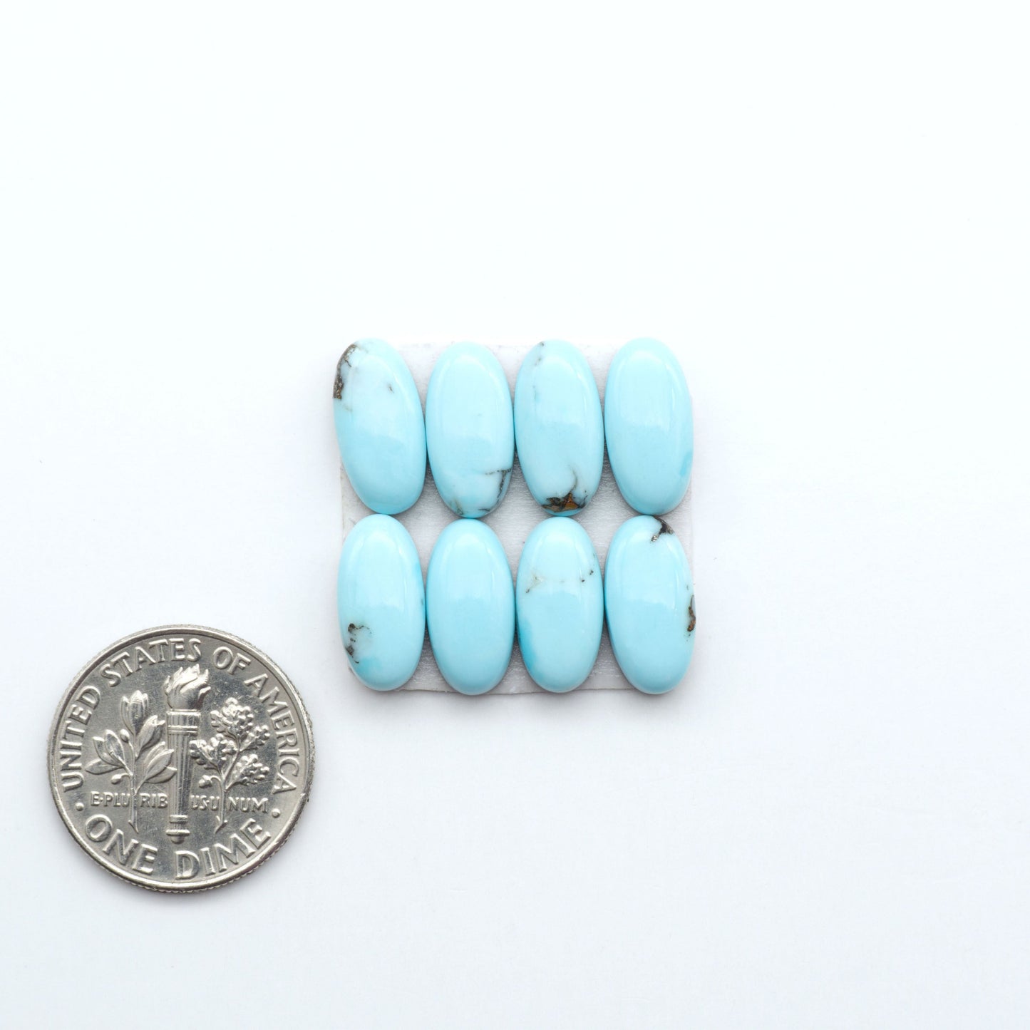 Enhance your jewelry designs with Pressed Turquoise Nugget Cabochons. Crafted from composite materials they add a captivating touch to your creations.