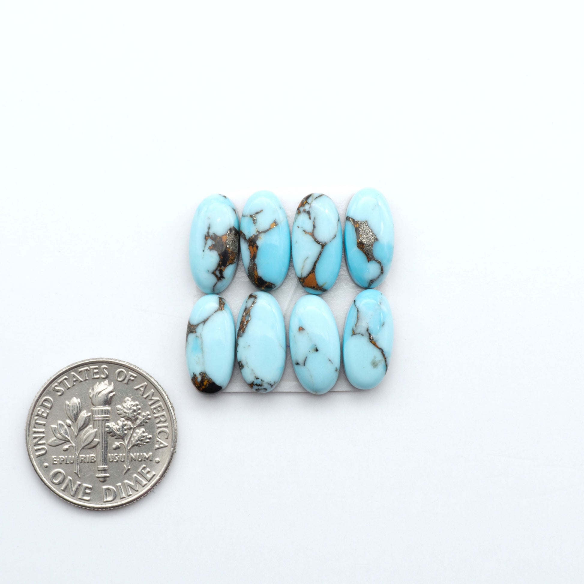 Enhance your jewelry designs with Pressed Turquoise Nugget Cabochons. Crafted from composite materials they add a captivating touch to your creations.
