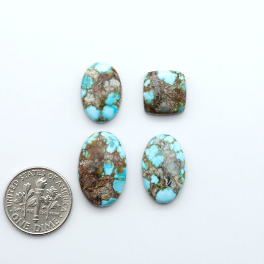 Kingman Turquoise Cabochons are a staple in the jewelry industry, known for their stunning blue-green color. Perfect for necklaces, earrings, and more!

