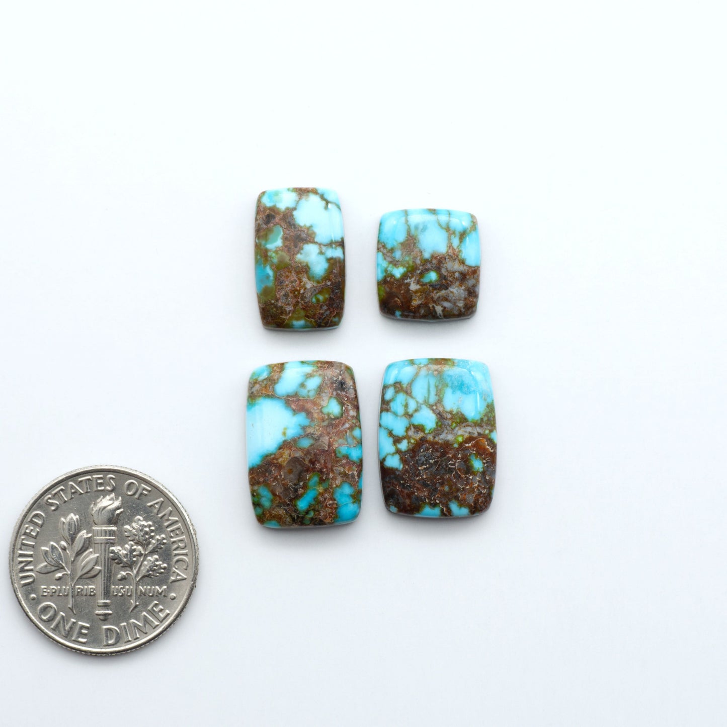 Kingman Turquoise Cabochons are a staple in the jewelry industry, known for their stunning blue-green color. Perfect for necklaces, earrings, and more!

