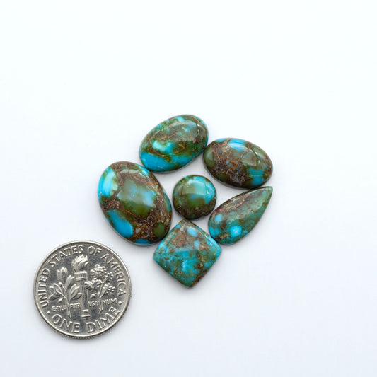 Kingman Turquoise Cabochons are a staple in the jewelry industry, known for their stunning blue-green color. Perfect for necklaces, earrings, and more!

