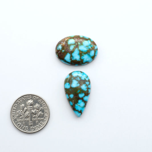Kingman Turquoise Cabochons are a staple in the jewelry industry, known for their stunning blue-green color. Perfect for necklaces, earrings, and more!

