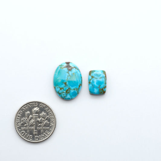 Kingman Turquoise Cabochons are a staple in the jewelry industry, known for their stunning blue-green color. Perfect for necklaces, earrings, and more!


