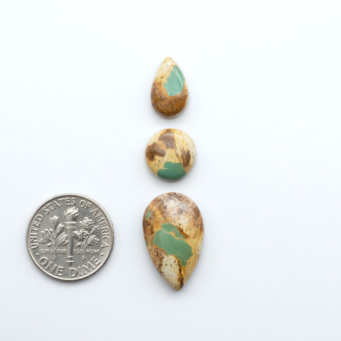 Royston Turquoise cabochons are famous for their distinctive matrix and unique green and blue hues, making them a favored option among jewelry designers.