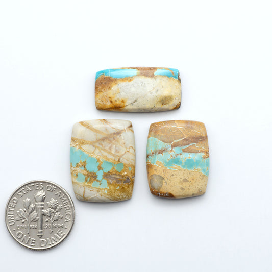 Royston Turquoise cabochons are famous for their distinctive matrix and unique green and blue hues, making them a favored option among jewelry designers.