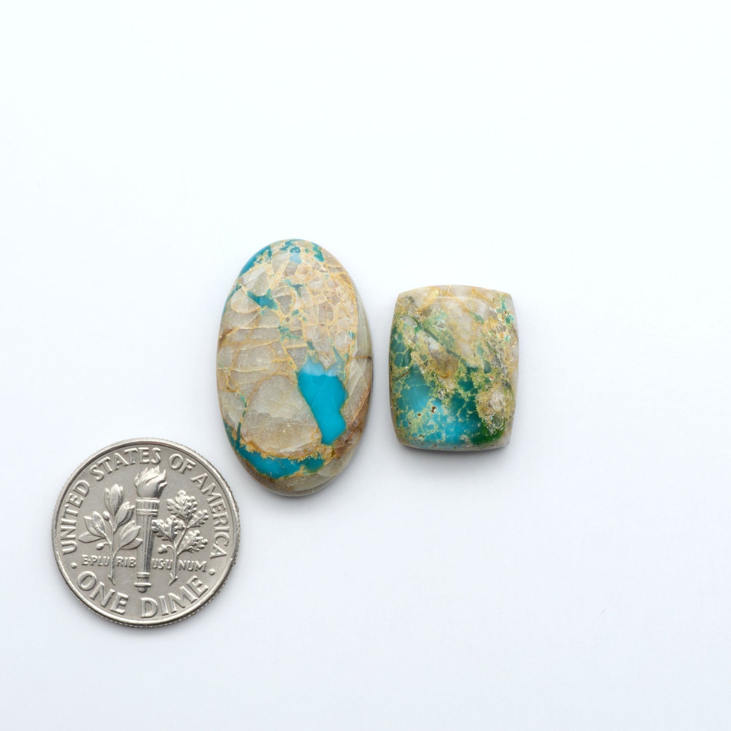 Royston Turquoise cabochons are famous for their distinctive matrix and unique green and blue hues, making them a favored option among jewelry designers.