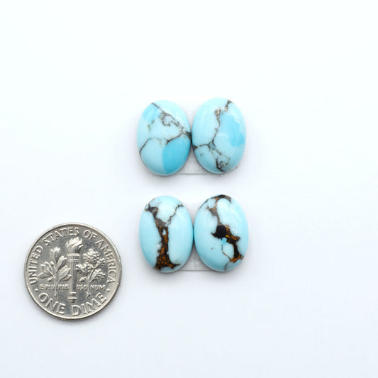 Enhance your jewelry designs with Pressed Turquoise Nugget Cabochons. Crafted from composite materials they add a captivating touch to your creations.