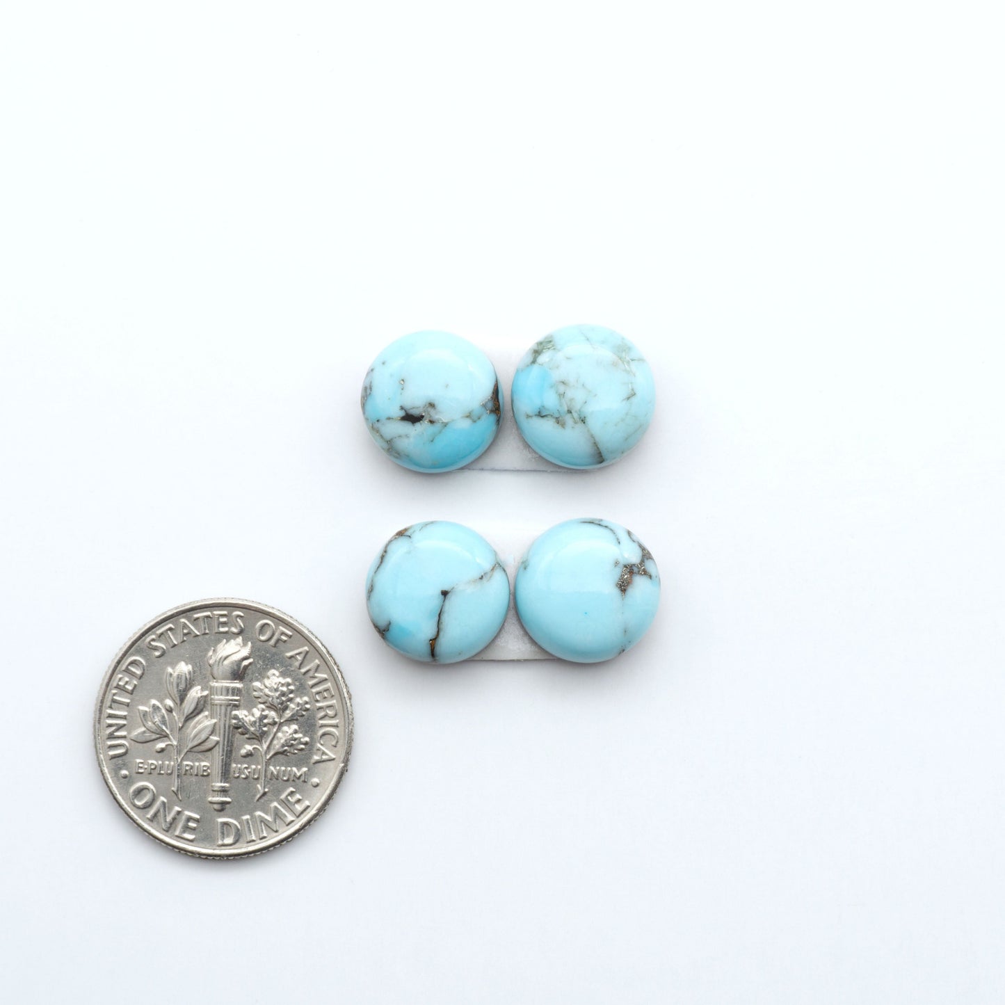 Enhance your jewelry designs with Pressed Turquoise Nugget Cabochons. Crafted from composite materials they add a captivating touch to your creations.