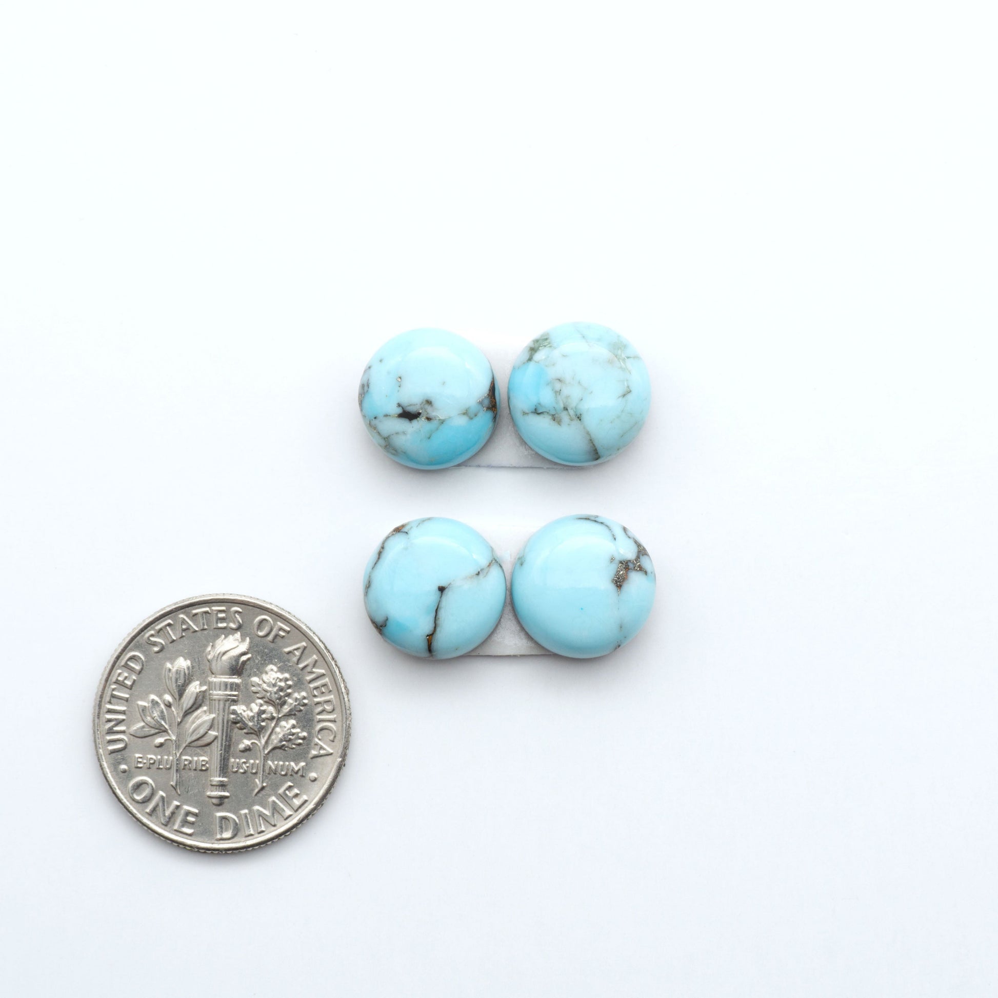 Enhance your jewelry designs with Pressed Turquoise Nugget Cabochons. Crafted from composite materials they add a captivating touch to your creations.