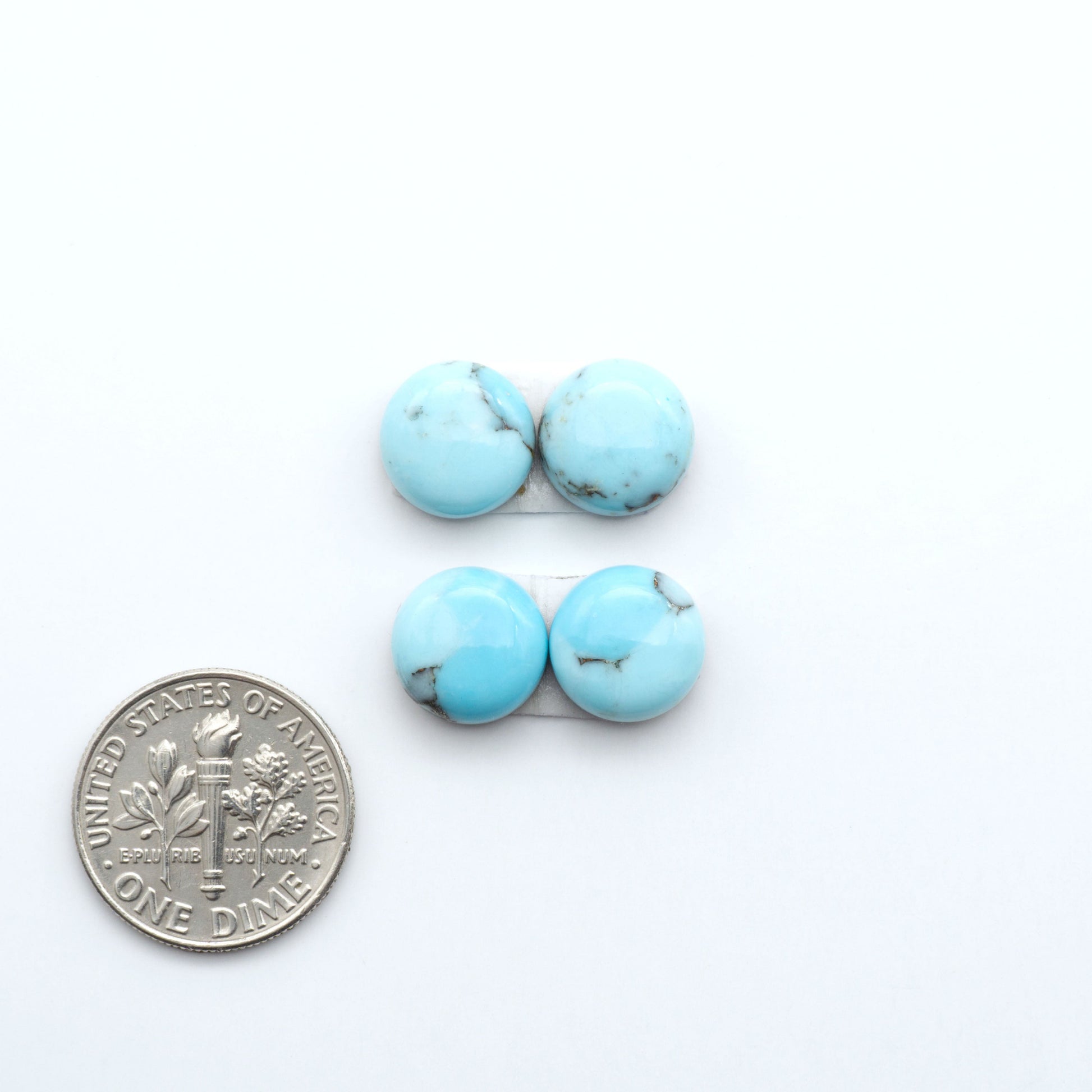 Enhance your jewelry designs with Pressed Turquoise Nugget Cabochons. Crafted from composite materials they add a captivating touch to your creations.