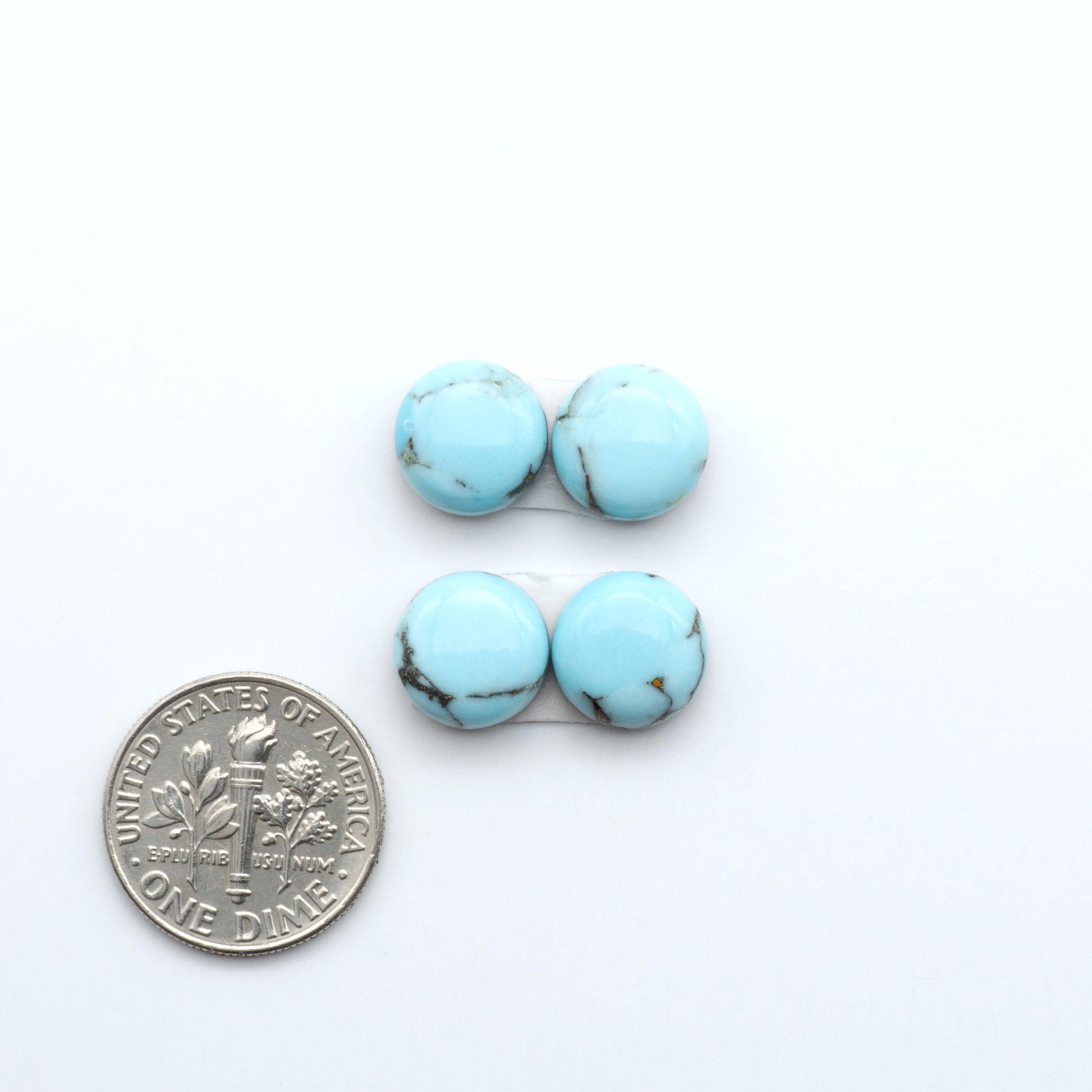Enhance your jewelry designs with Pressed Turquoise Nugget Cabochons. Crafted from composite materials they add a captivating touch to your creations.