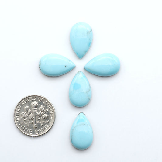 Enhance your jewelry designs with Pressed Turquoise Nugget Cabochons. Crafted from composite materials they add a captivating touch to your creations.