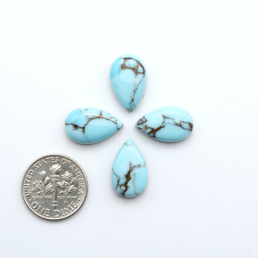 Enhance your jewelry designs with Pressed Turquoise Nugget Cabochons. Crafted from composite materials they add a captivating touch to your creations.