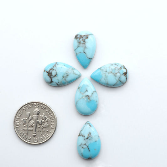 Enhance your jewelry designs with Pressed Turquoise Nugget Cabochons. Crafted from composite materials they add a captivating touch to your creations.
