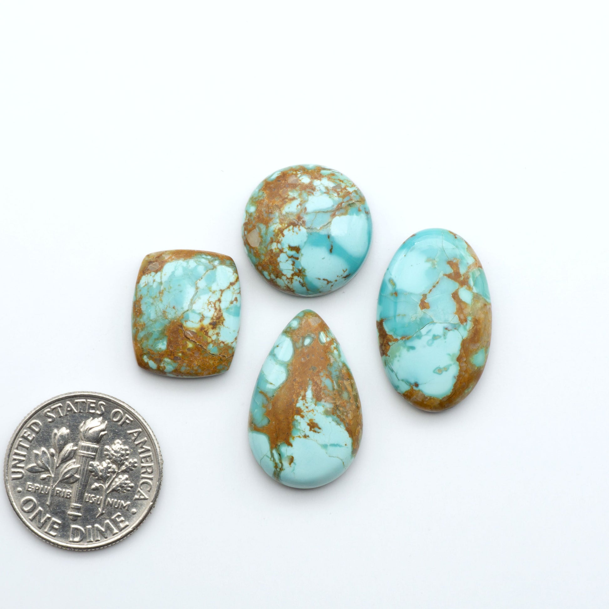 Add a touch of beauty to your collection with our stunning Pilot Mountain Turquoise Cabochons. Perfect for jewelry making each piece is truly one-of-a-kind.