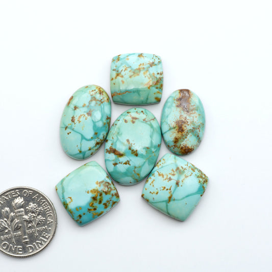 Add a touch of beauty to your collection with our stunning Pilot Mountain Turquoise Cabochons. Perfect for jewelry making each piece is truly one-of-a-kind.