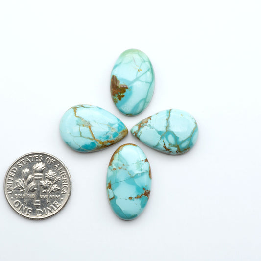 Add a touch of beauty to your collection with our stunning Pilot Mountain Turquoise Cabochons. Perfect for jewelry making each piece is truly one-of-a-kind.