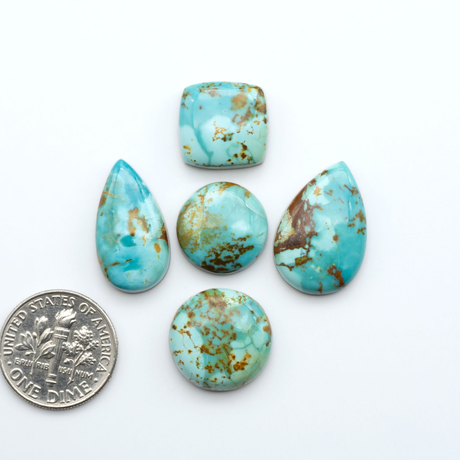Add a touch of beauty to your collection with our stunning Pilot Mountain Turquoise Cabochons. Perfect for jewelry making each piece is truly one-of-a-kind.