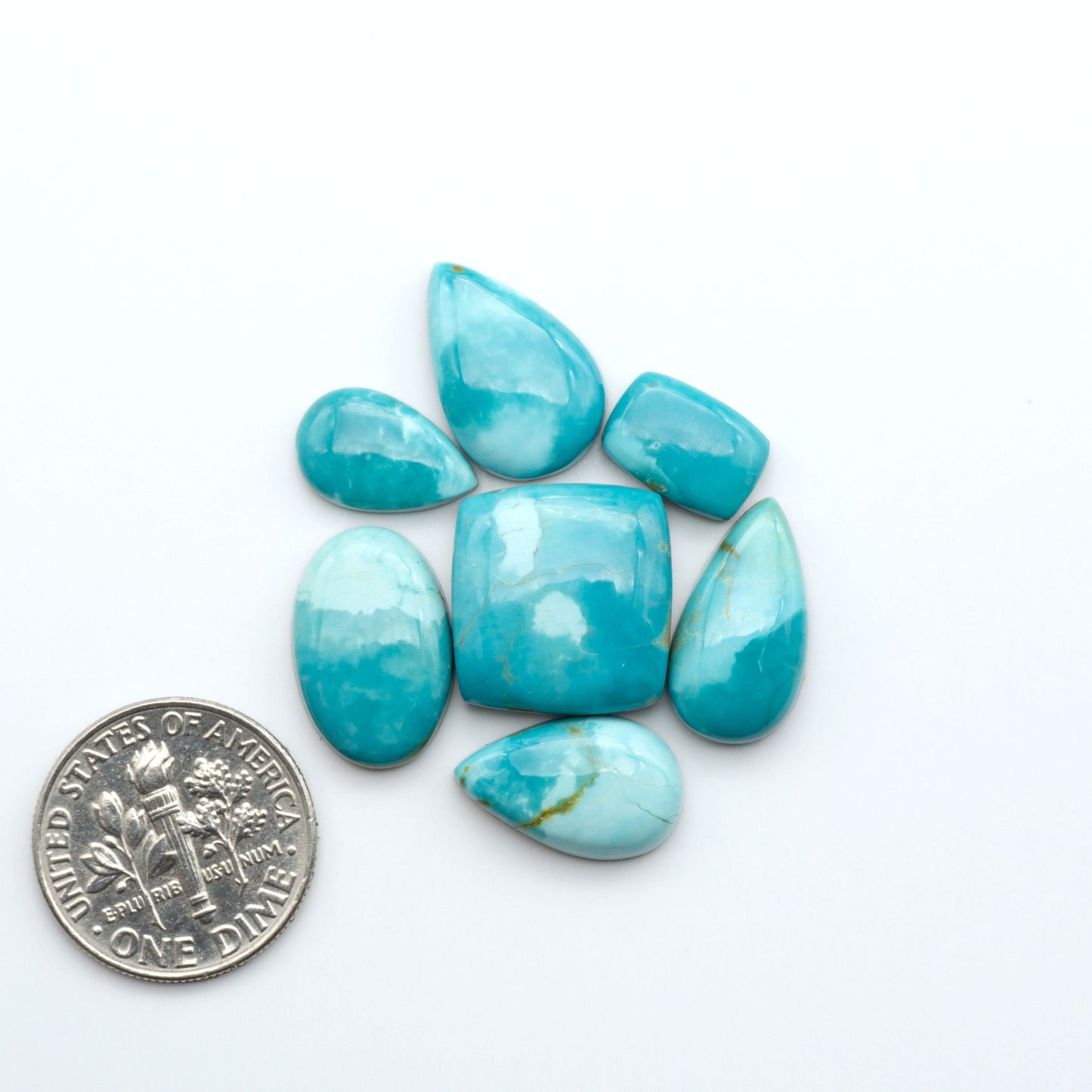 Add a touch of beauty to your collection with our stunning Pilot Mountain Turquoise Cabochons. Perfect for jewelry making each piece is truly one-of-a-kind.