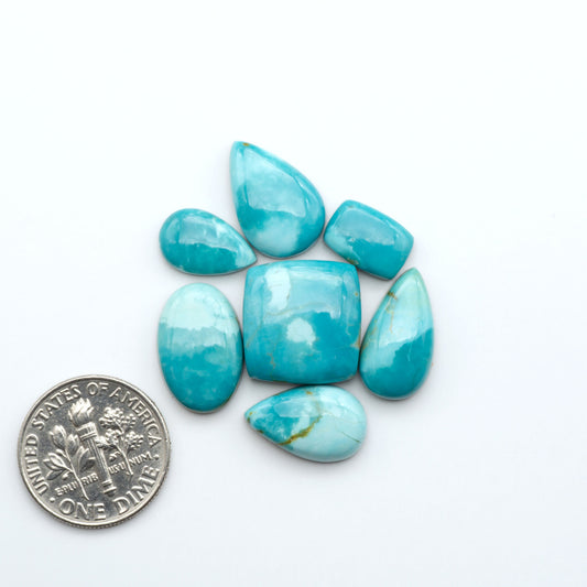 Add a touch of beauty to your collection with our stunning Pilot Mountain Turquoise Cabochons. Perfect for jewelry making each piece is truly one-of-a-kind.