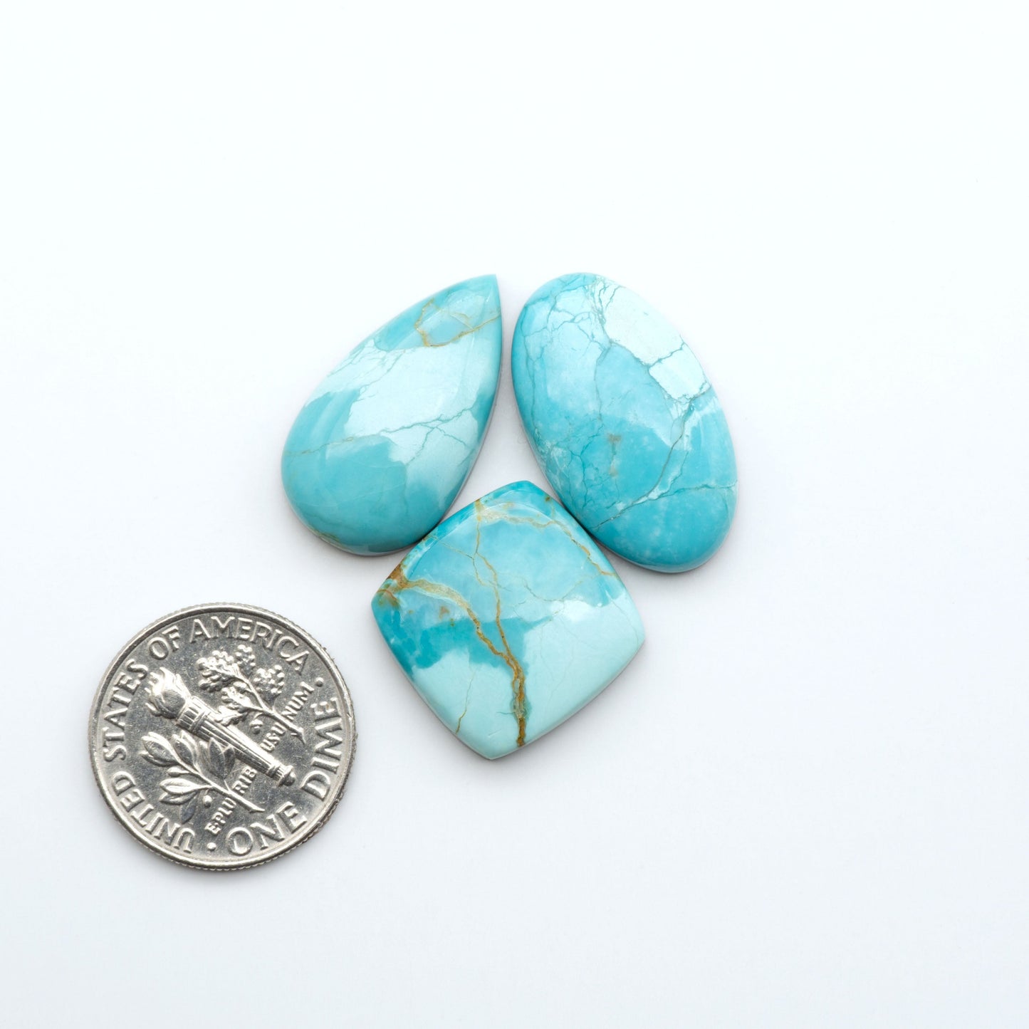 Add a touch of beauty to your collection with our stunning Pilot Mountain Turquoise Cabochons. Perfect for jewelry making each piece is truly one-of-a-kind.