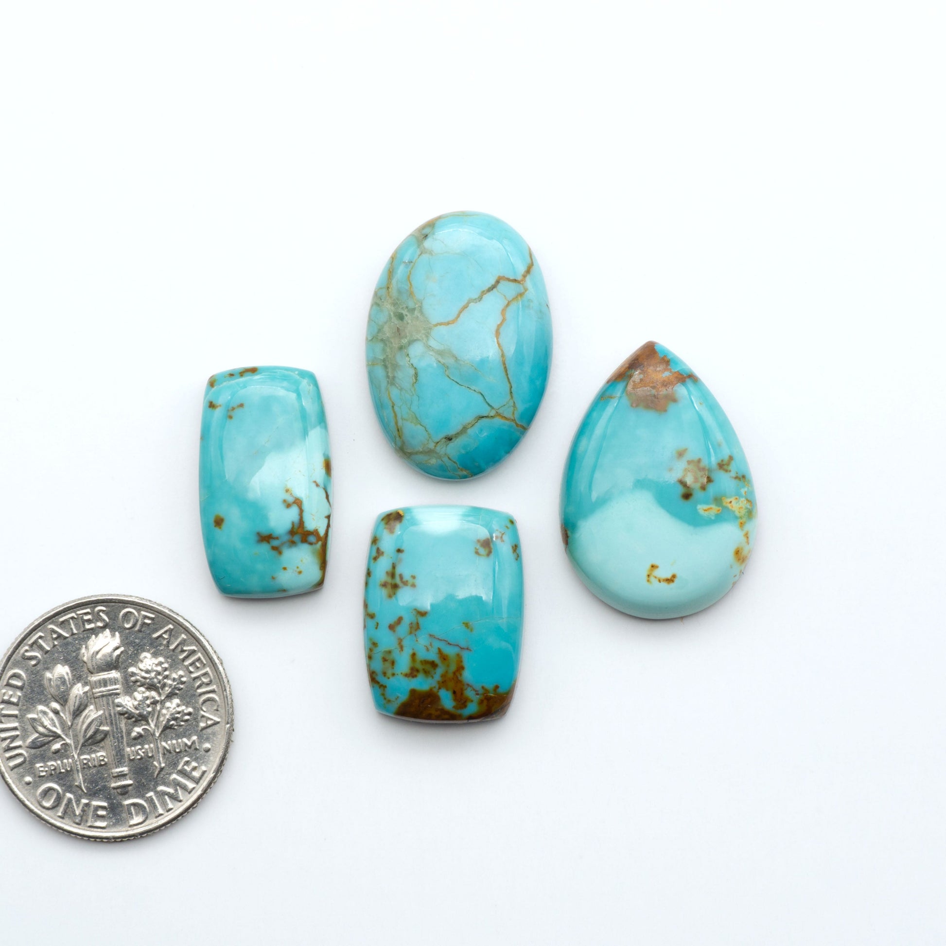 Add a touch of beauty to your collection with our stunning Pilot Mountain Turquoise Cabochons. Perfect for jewelry making each piece is truly one-of-a-kind.