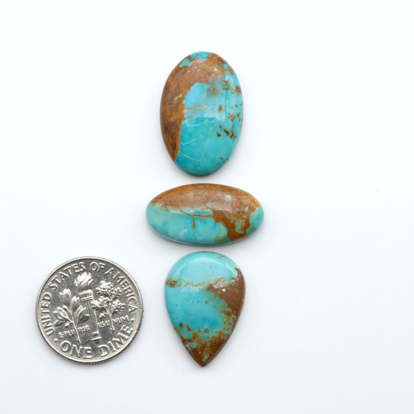 Add a touch of beauty to your collection with our stunning Pilot Mountain Turquoise Cabochons. Perfect for jewelry making each piece is truly one-of-a-kind.