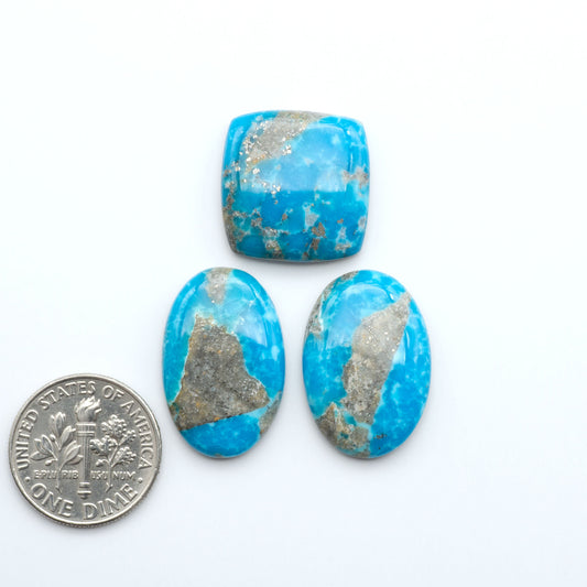 Nacozari turquoise cabochons are striking gemstones known for their vibrant blue to greenish-blue colors and pyrite, these stones are prized in jewelry making.