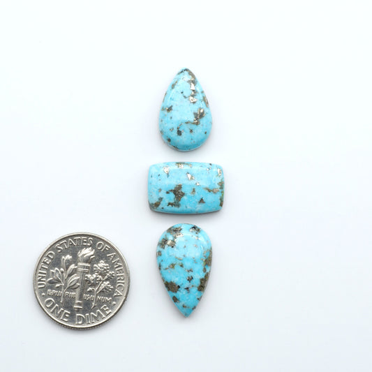 Nacozari turquoise cabochons are striking gemstones known for their vibrant blue to greenish-blue colors and pyrite, these stones are prized in jewelry making.
