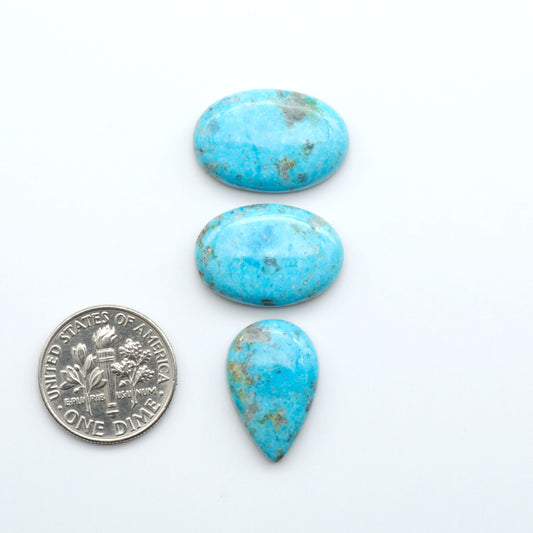 Nacozari turquoise cabochons are striking gemstones known for their vibrant blue to greenish-blue colors and pyrite, these stones are prized in jewelry making.