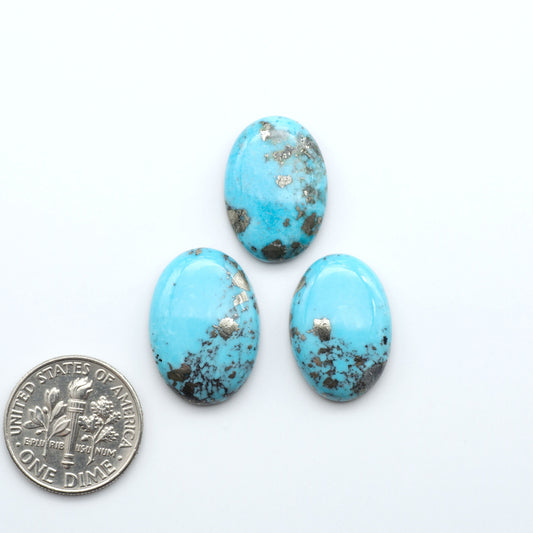 Nacozari turquoise cabochons are striking gemstones known for their vibrant blue to greenish-blue colors and pyrite, these stones are prized in jewelry making.