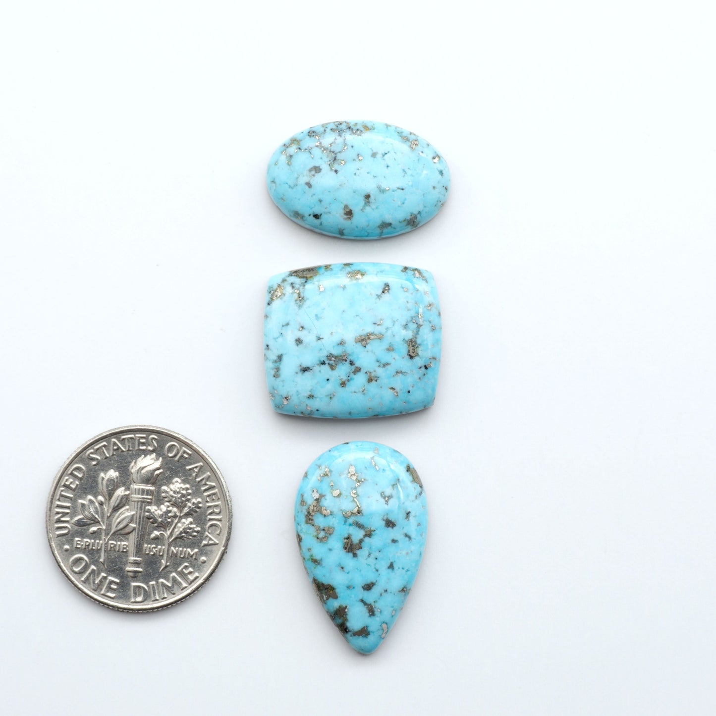 Nacozari turquoise cabochons are striking gemstones known for their vibrant blue to greenish-blue colors and pyrite, these stones are prized in jewelry making.