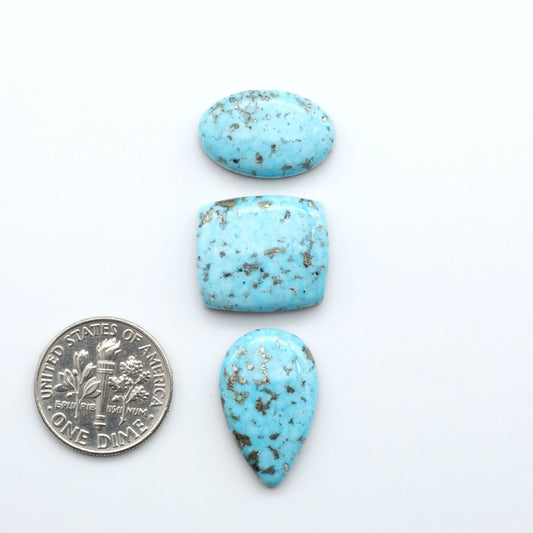 Nacozari turquoise cabochons are striking gemstones known for their vibrant blue to greenish-blue colors and pyrite, these stones are prized in jewelry making.