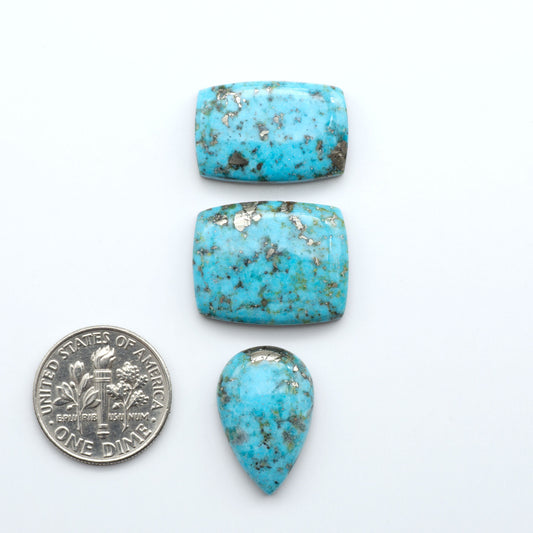 Nacozari turquoise cabochons are striking gemstones known for their vibrant blue to greenish-blue colors and pyrite, these stones are prized in jewelry making.